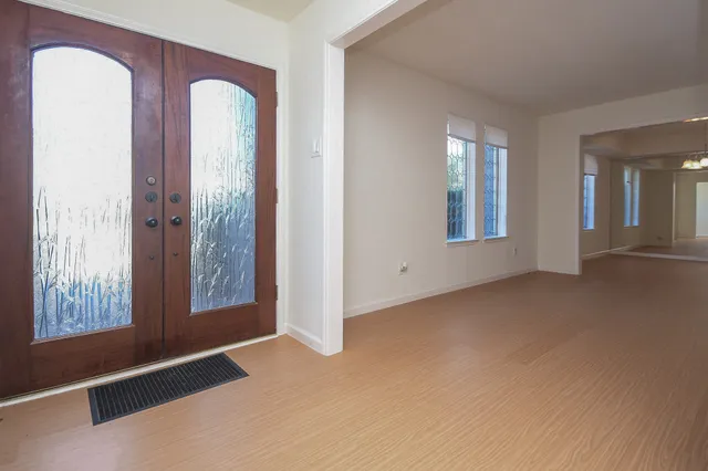 an empty room with windows