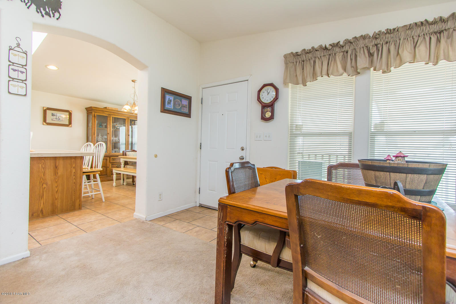 2691 North Reed Road Chino Valley, AZ 86323 - Photo 8 of 36 a bedroom with furniture and a window