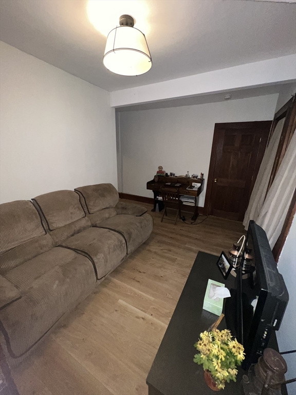 36 Maple Avenue, Unit 2 Bridgewater, MA 02324 - Photo 13 of 14 a living room with furniture