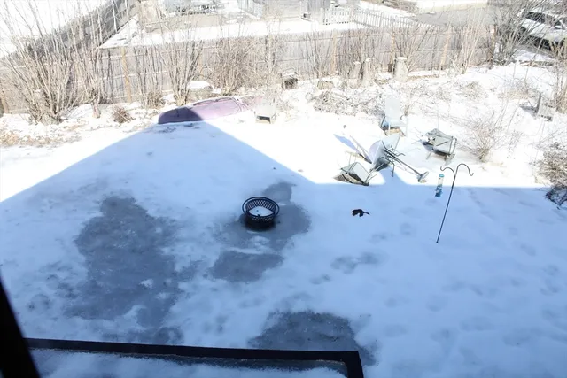 a view of roof and yard