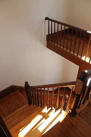 a view of balcony with wooden floor