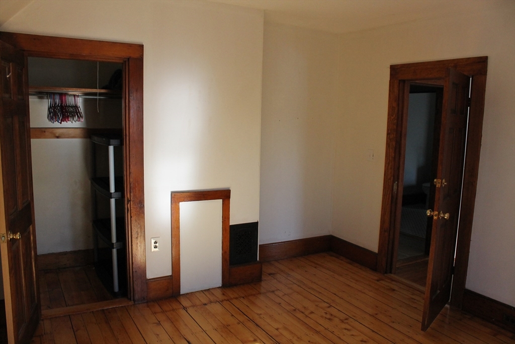 36 Maple Avenue, Unit 2 Bridgewater, MA 02324 - Photo 6 of 14 a view of empty room with wooden floor
