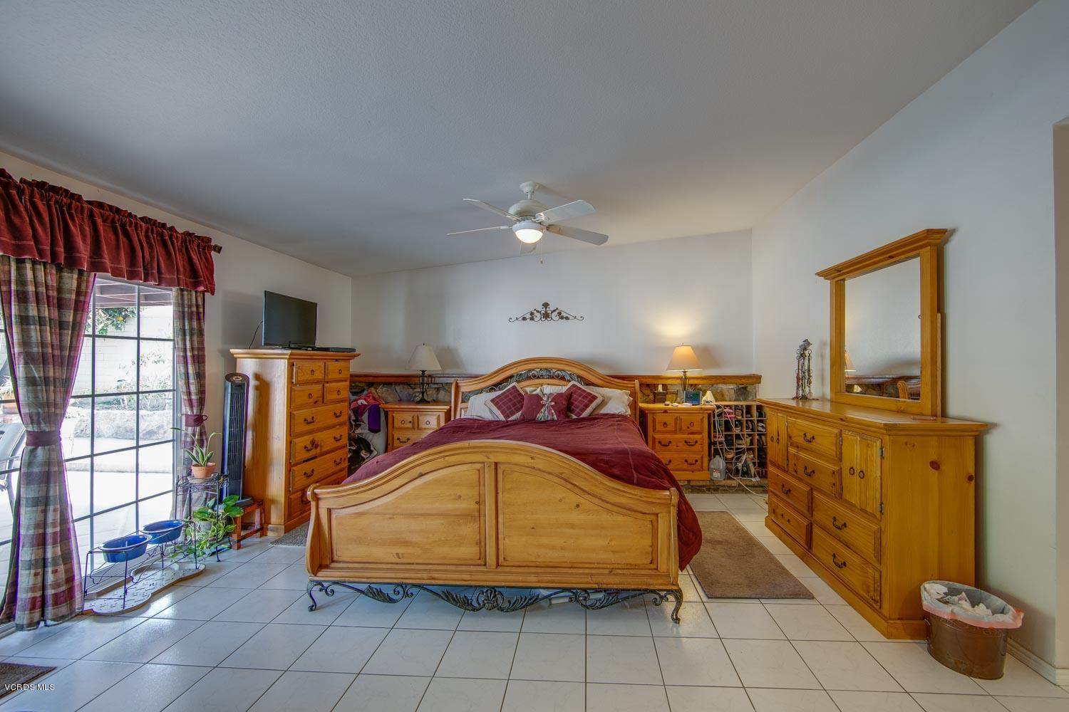 4295 Springfield Street Simi Valley, CA 93063 - Photo 12 of 40 a bedroom with a bed and window