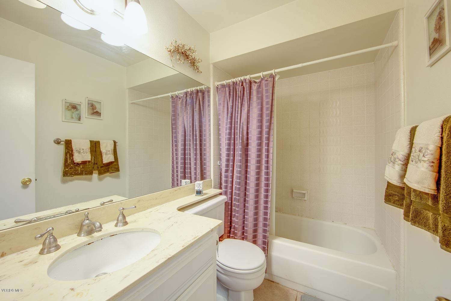 4295 Springfield Street Simi Valley, CA 93063 - Photo 20 of 40 a bathroom with a sink toilet and shower