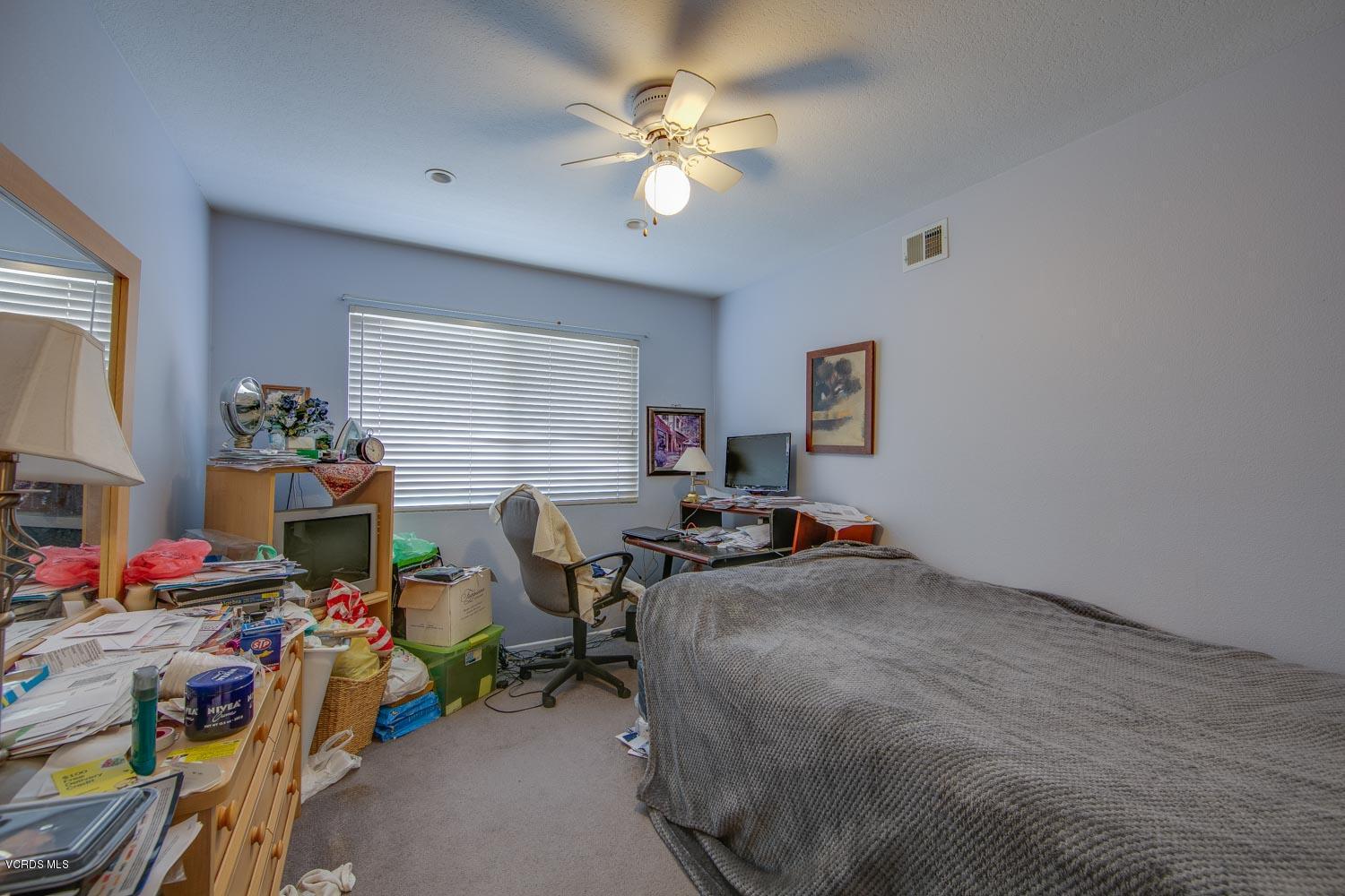 4295 Springfield Street Simi Valley, CA 93063 - Photo 22 of 40 a bedroom with furniture and a window