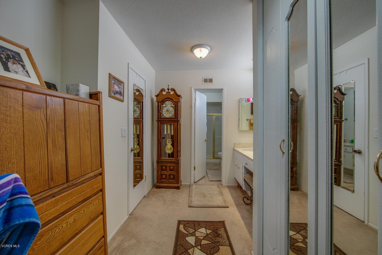 4295 Springfield Street Simi Valley, CA 93063 - Photo 26 of 40 a view of hallway with shower and tub