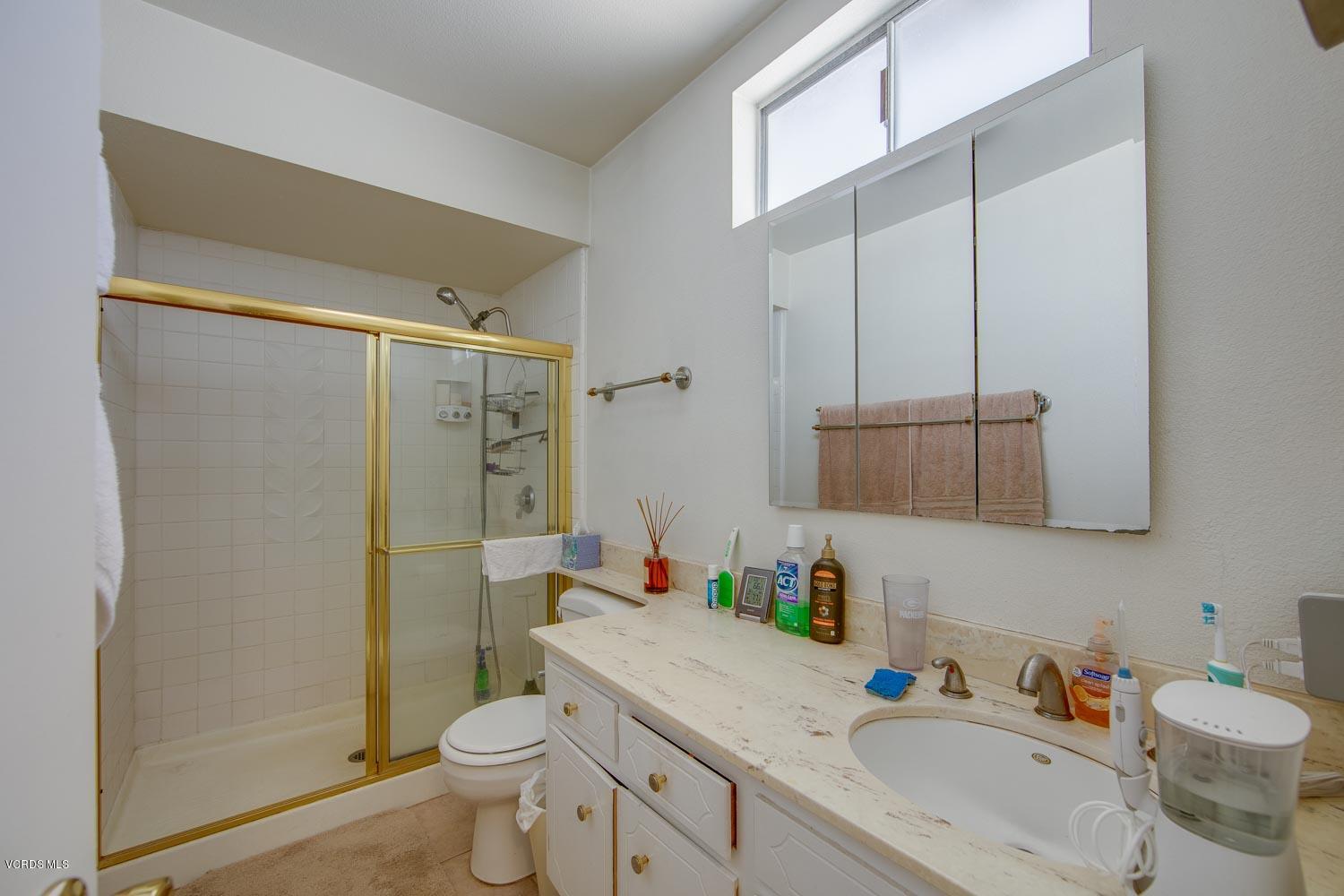 4295 Springfield Street Simi Valley, CA 93063 - Photo 28 of 40 a bathroom with a sink toilet and shower