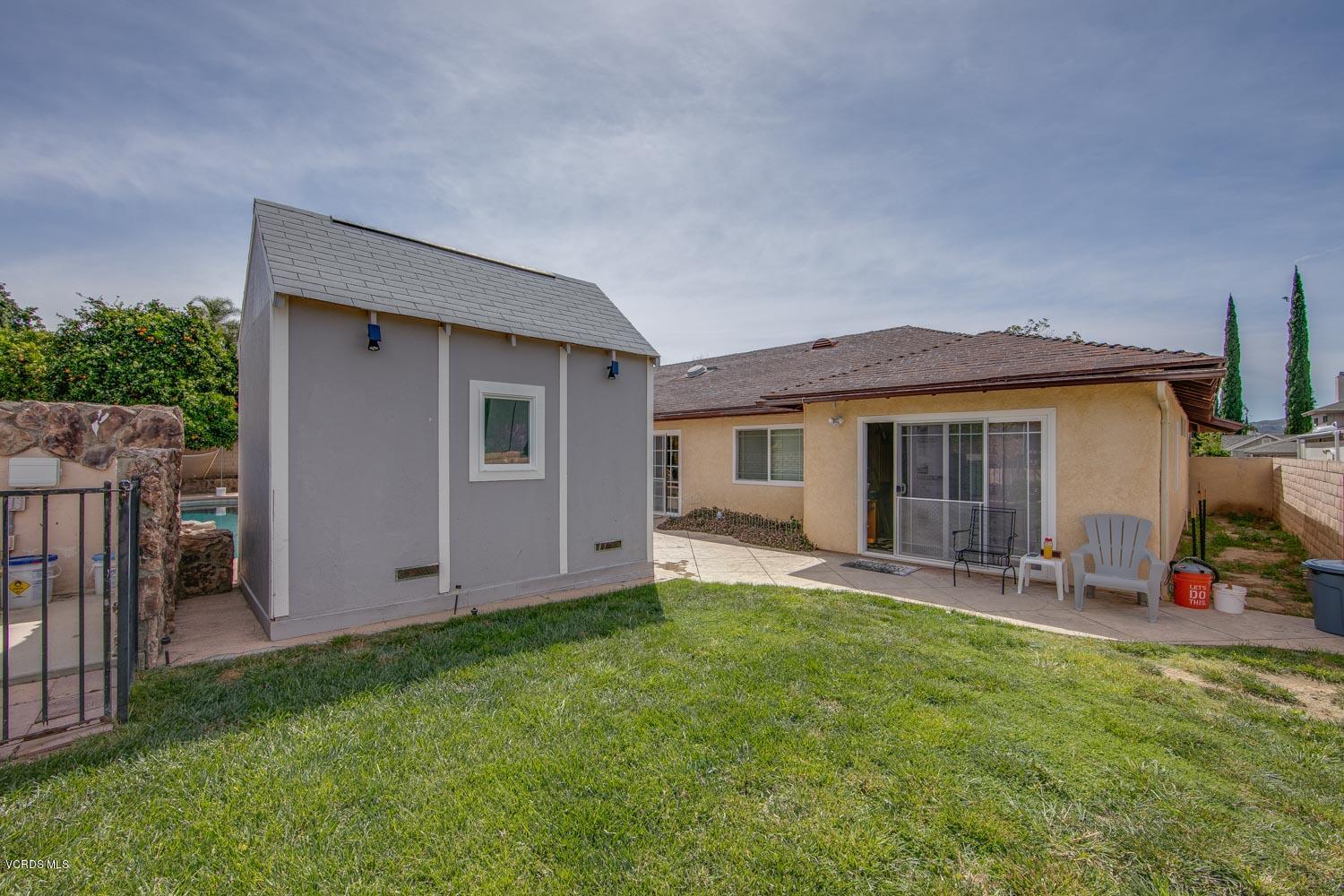 4295 Springfield Street Simi Valley, CA 93063 - Photo 31 of 40 a view of a house with a yard and sitting area