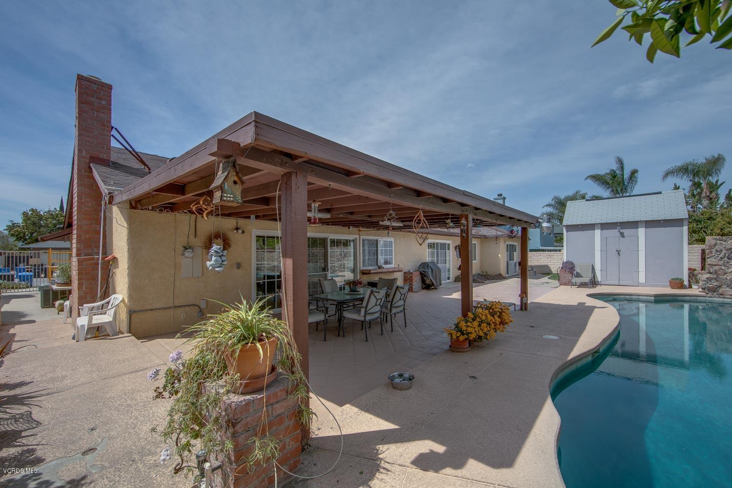 4295 Springfield Street Simi Valley, CA 93063 - Photo 33 of 40 a view of a house with backyard and sitting area