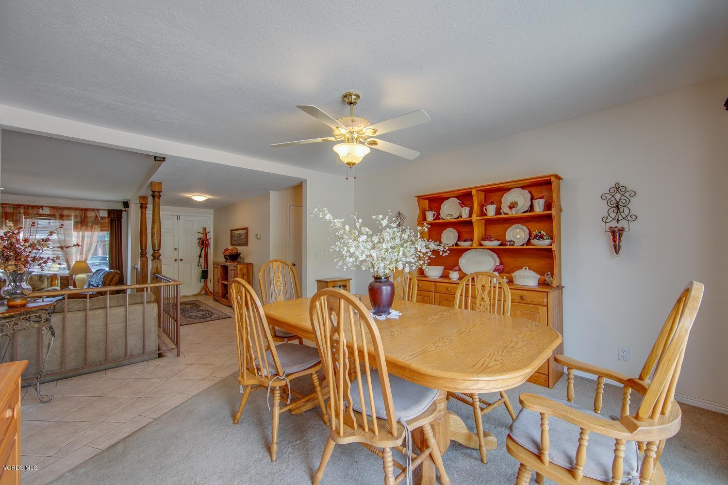 4295 Springfield Street Simi Valley, CA 93063 - Photo 8 of 40 a dining room with furniture a chandelier and window