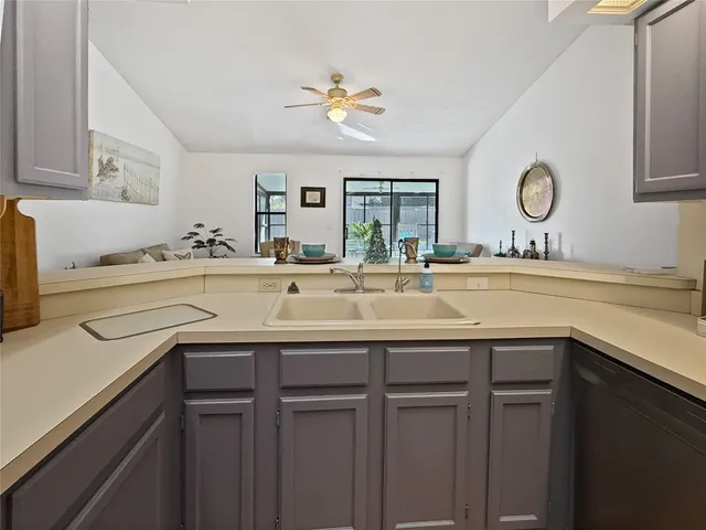 a kitchen with a sink and a cabinets