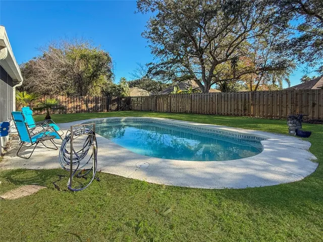 a view of a backyard with a slide