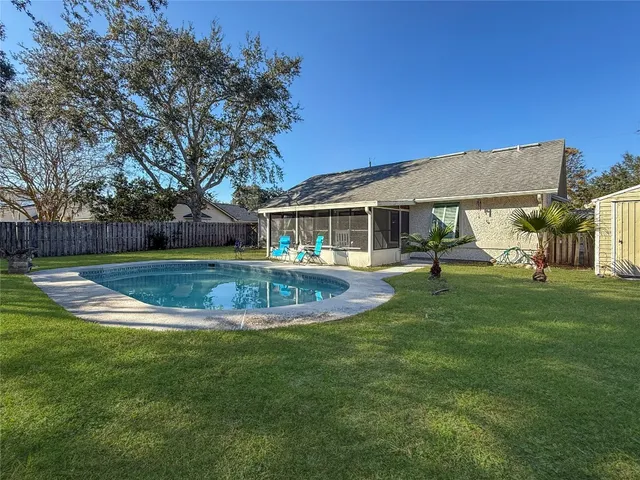 a view of a house with a swimming pool
