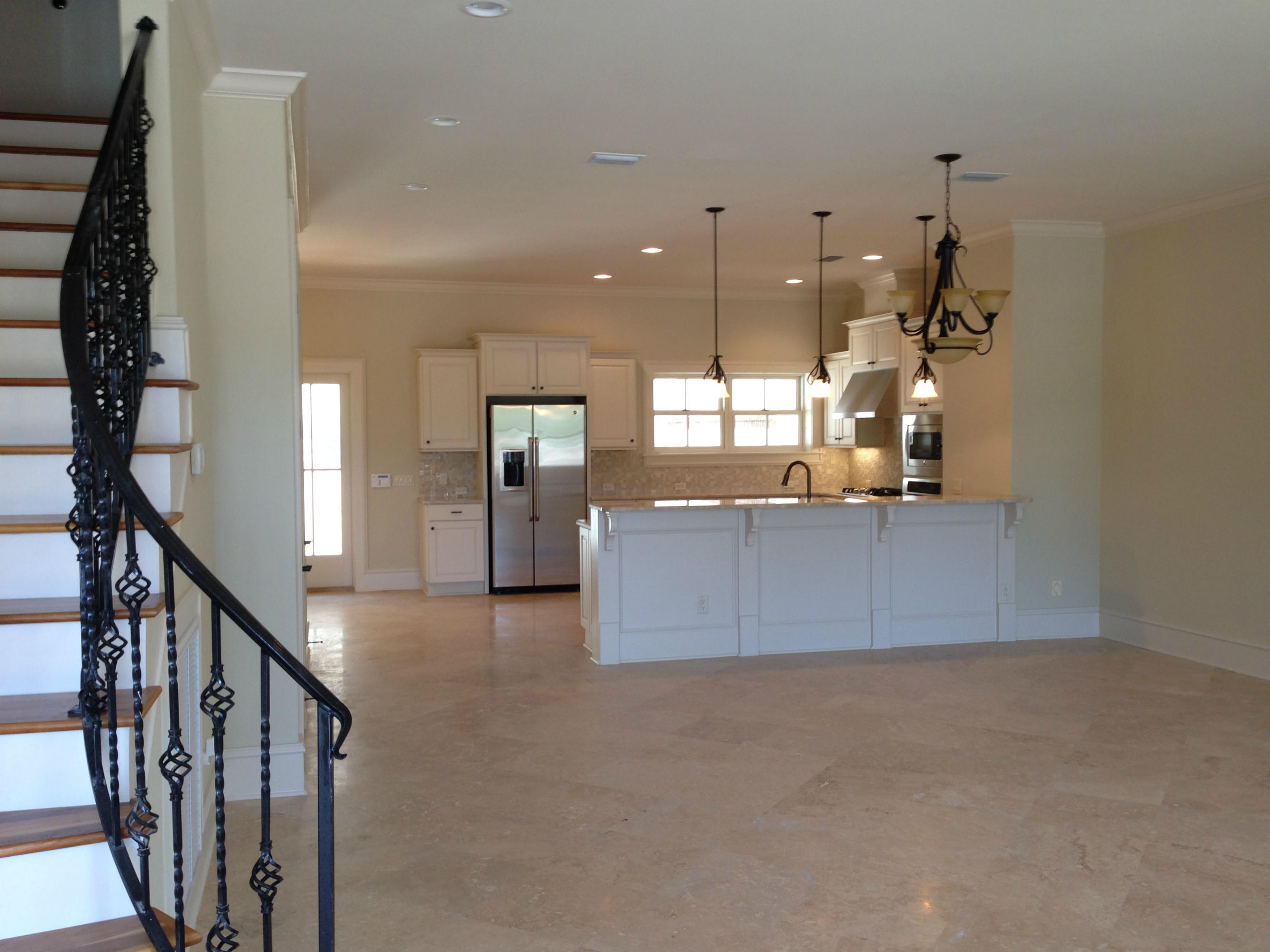 2 Prominence Inlet Beach, Unit 2 Inlet Beach, FL 32461 - Photo 2 of 2 a view of a kitchen with a sink and a living room