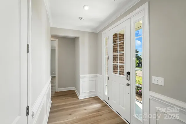 a view of a balcony with wooden floor