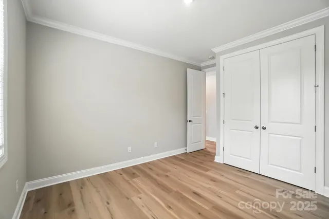 a bathroom with a sink and a window