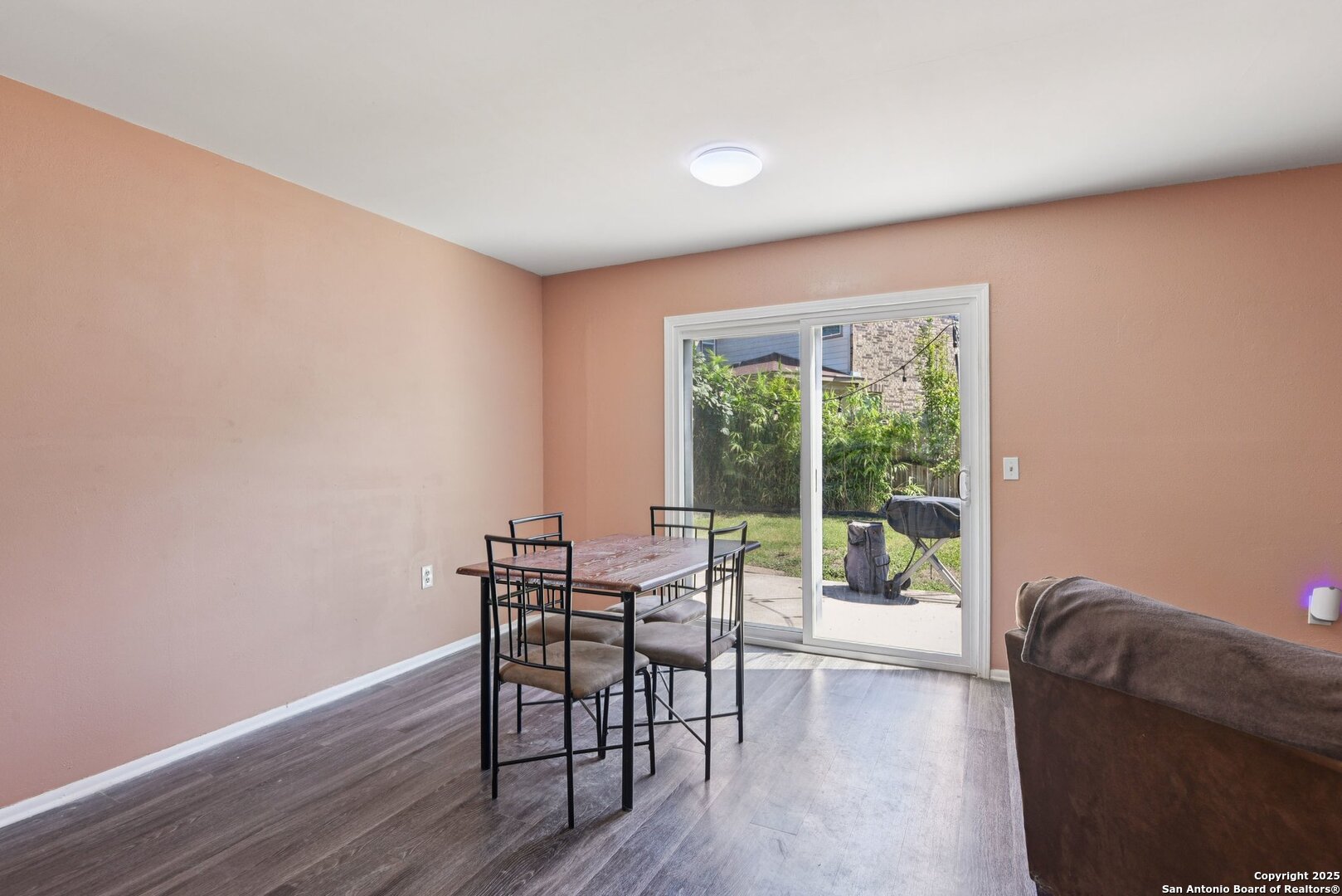 113 Friendswood Path Universal City, TX 78148 - Photo 11 of 40 a living room with furniture and wooden floor