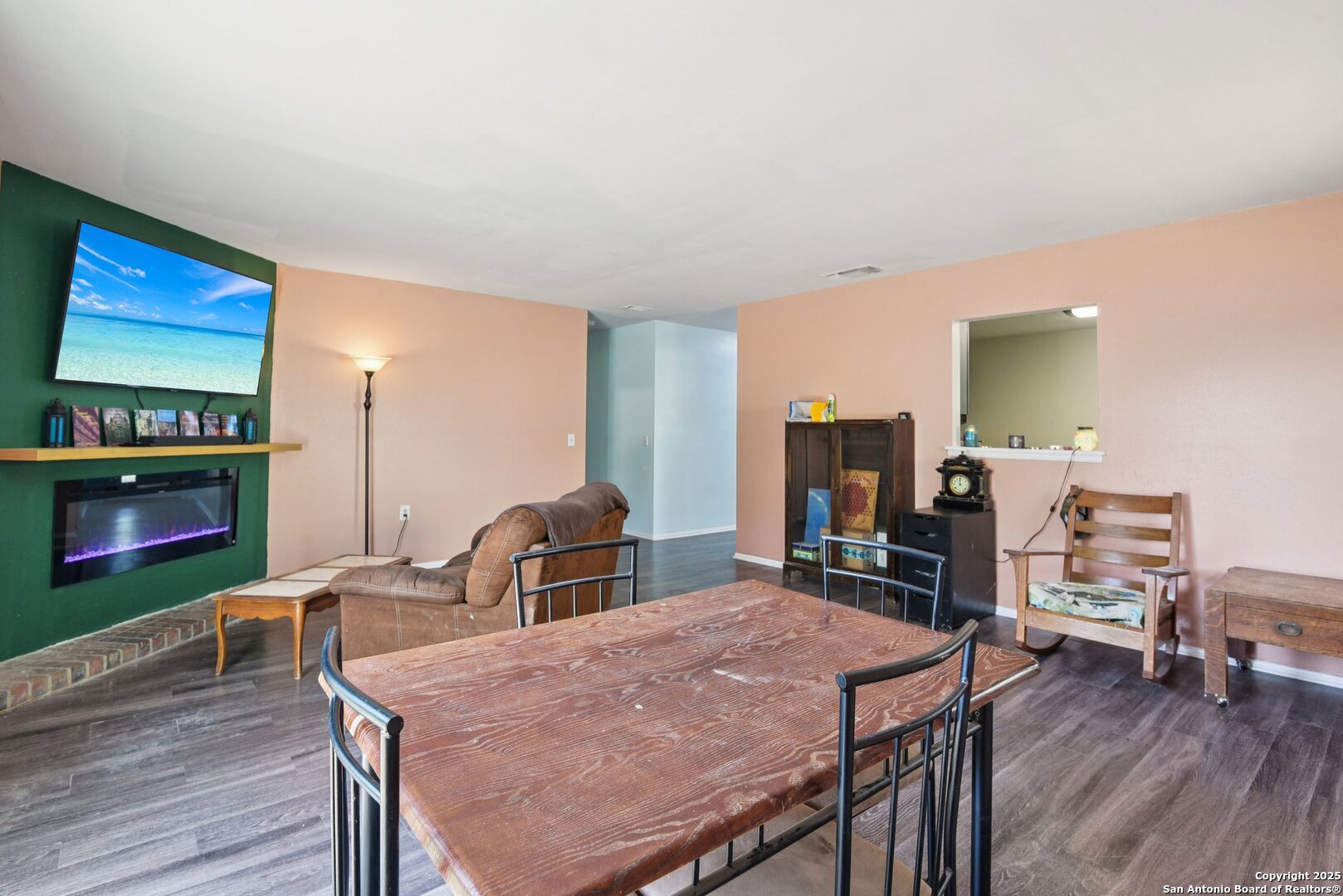 113 Friendswood Path Universal City, TX 78148 - Photo 13 of 40 a dining room with furniture and wooden floor