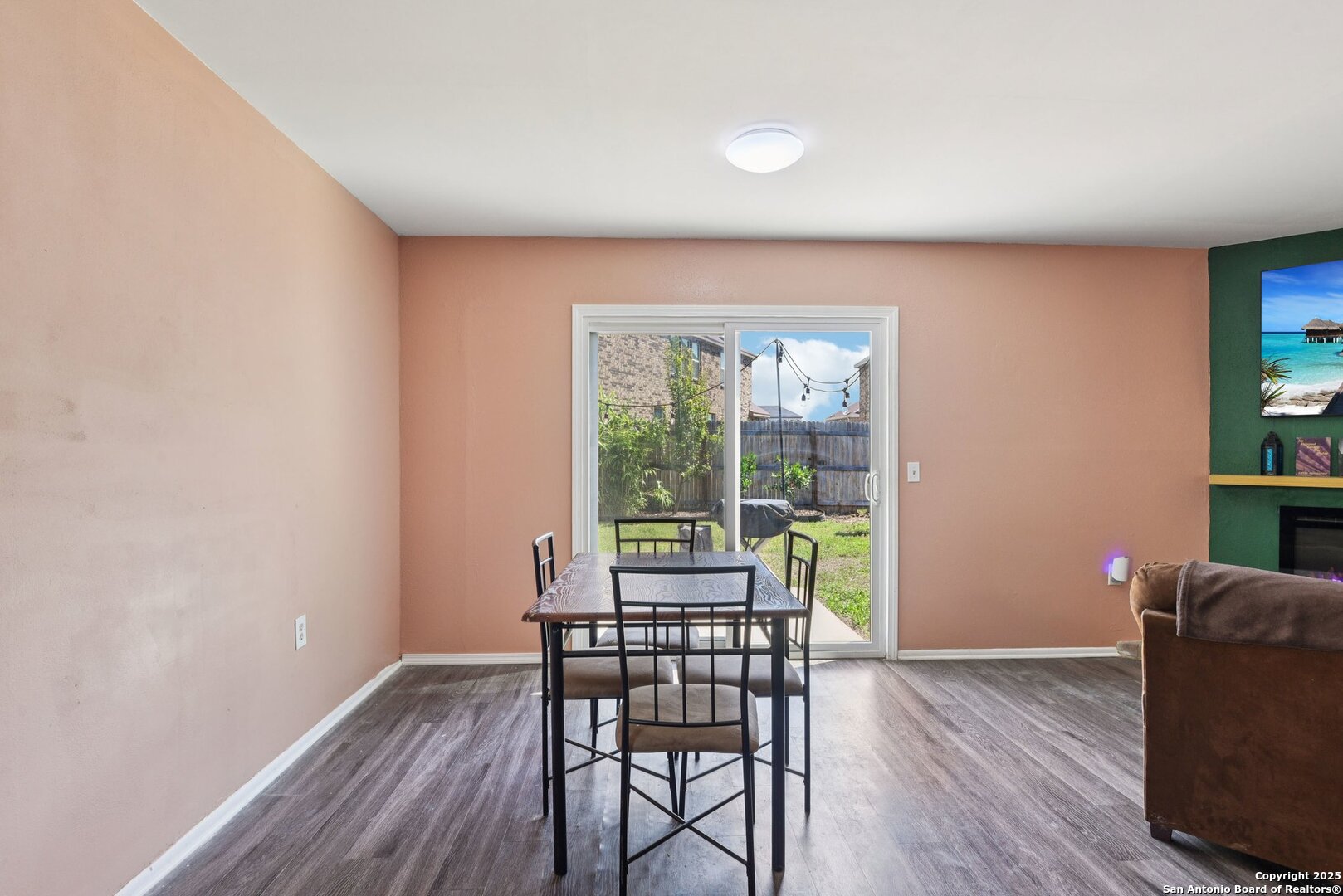 113 Friendswood Path Universal City, TX 78148 - Photo 15 of 40 a view of a dining room with furniture window and wooden floor