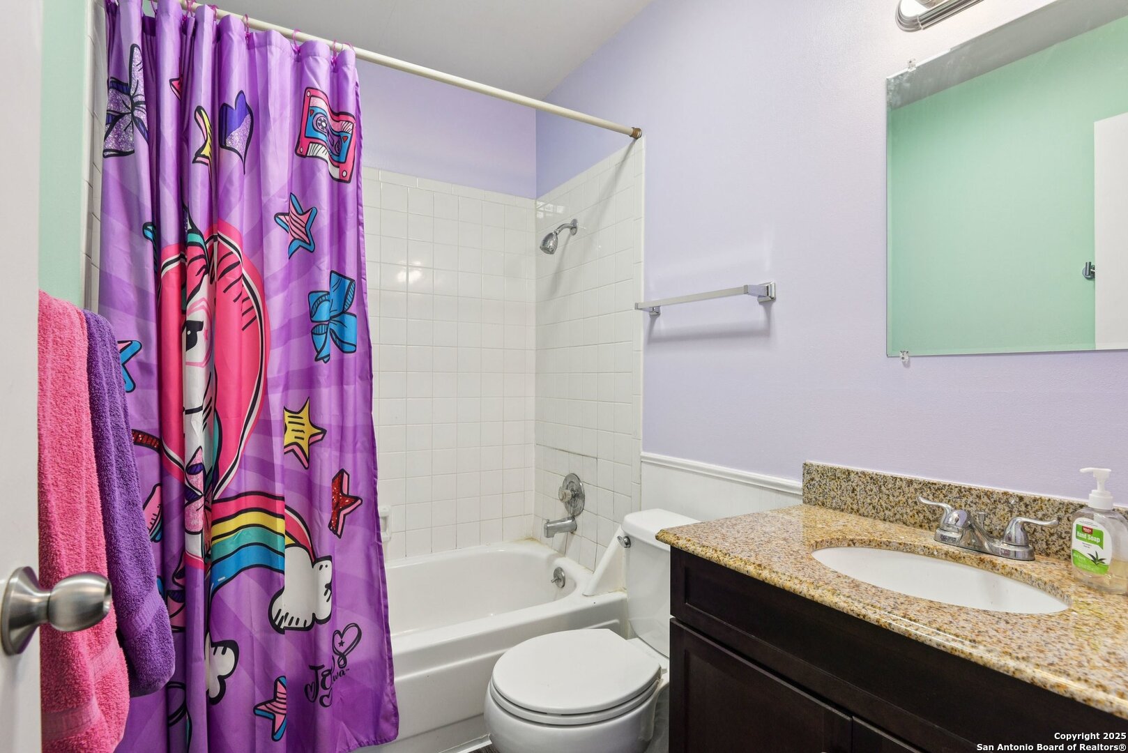 113 Friendswood Path Universal City, TX 78148 - Photo 36 of 40 a bathroom with a granite countertop sink a toilet and a bathtub