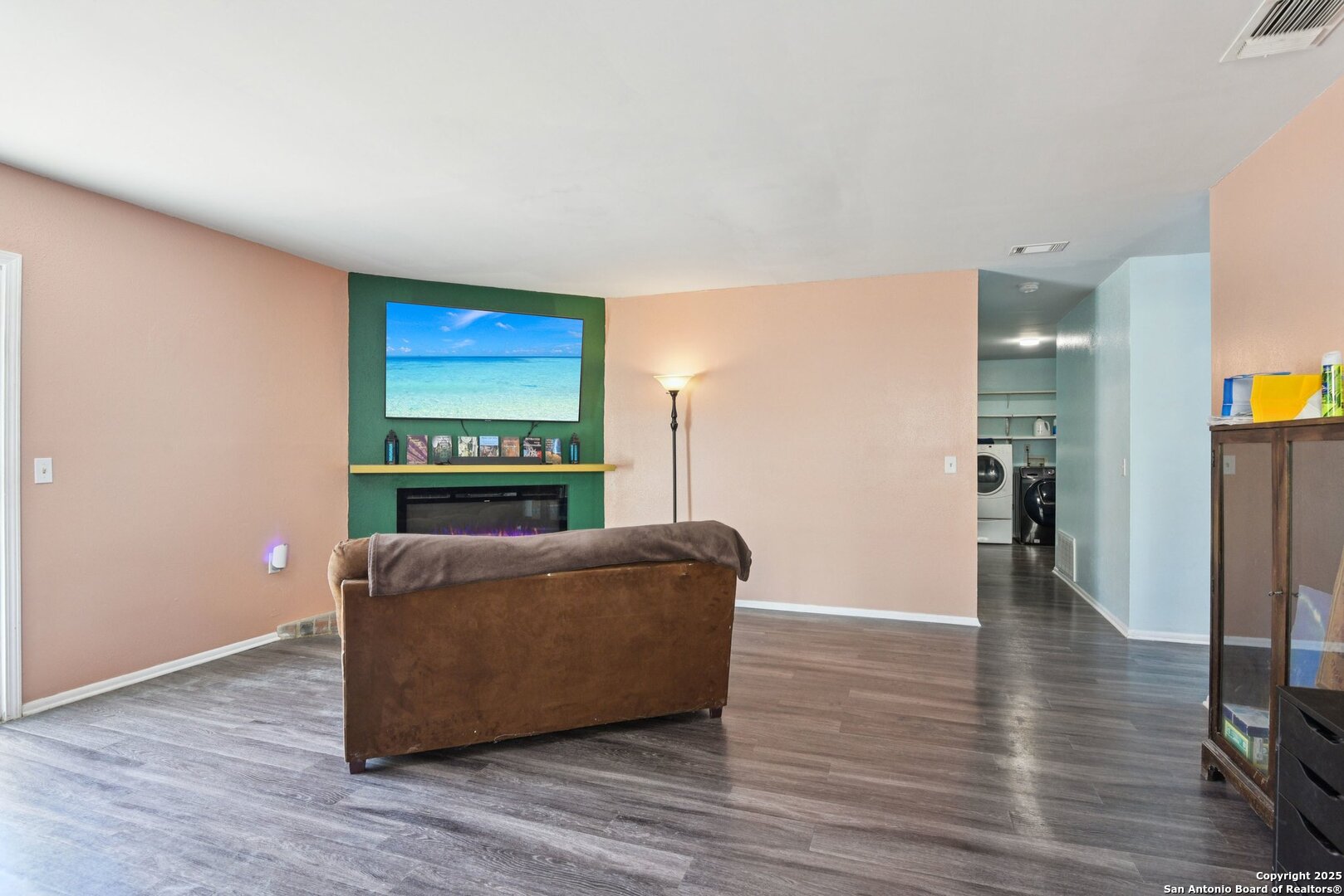 113 Friendswood Path Universal City, TX 78148 - Photo 7 of 40 a living room with furniture and a flat screen tv