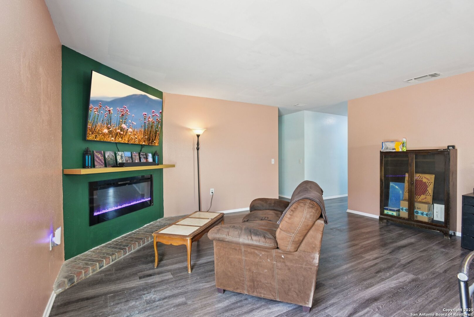 113 Friendswood Path Universal City, TX 78148 - Photo 8 of 40 a living room with furniture fireplace and flat screen tv