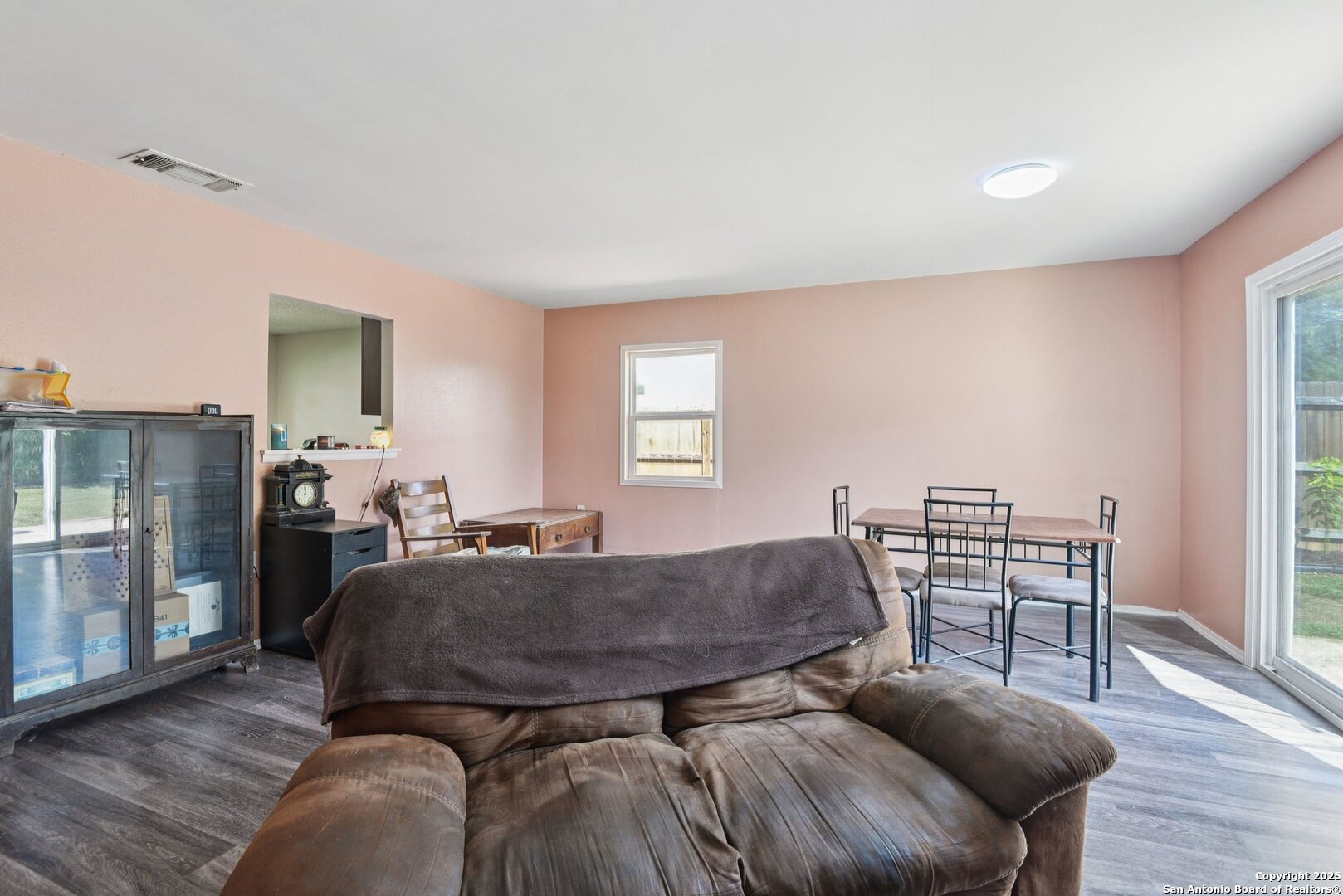113 Friendswood Path Universal City, TX 78148 - Photo 10 of 40 a view of a livingroom with furniture and wooden floor