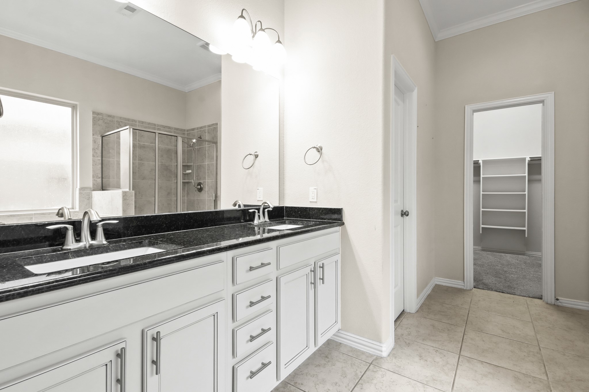 23122 Biddle Drive Porter, TX 77365 - Photo 10 of 26 Spacious bathroom, and plenty of open space in walk in closet.