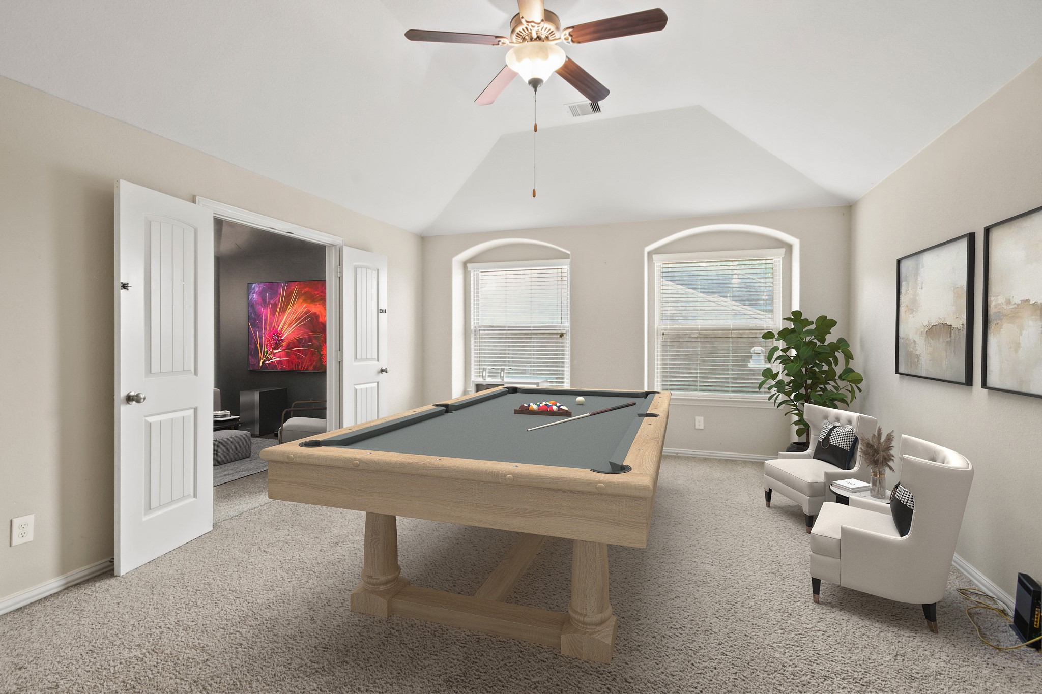 23122 Biddle Drive Porter, TX 77365 - Photo 12 of 26 Spacious game room with high ceilings, connected to a separate media room for added entertainment space.