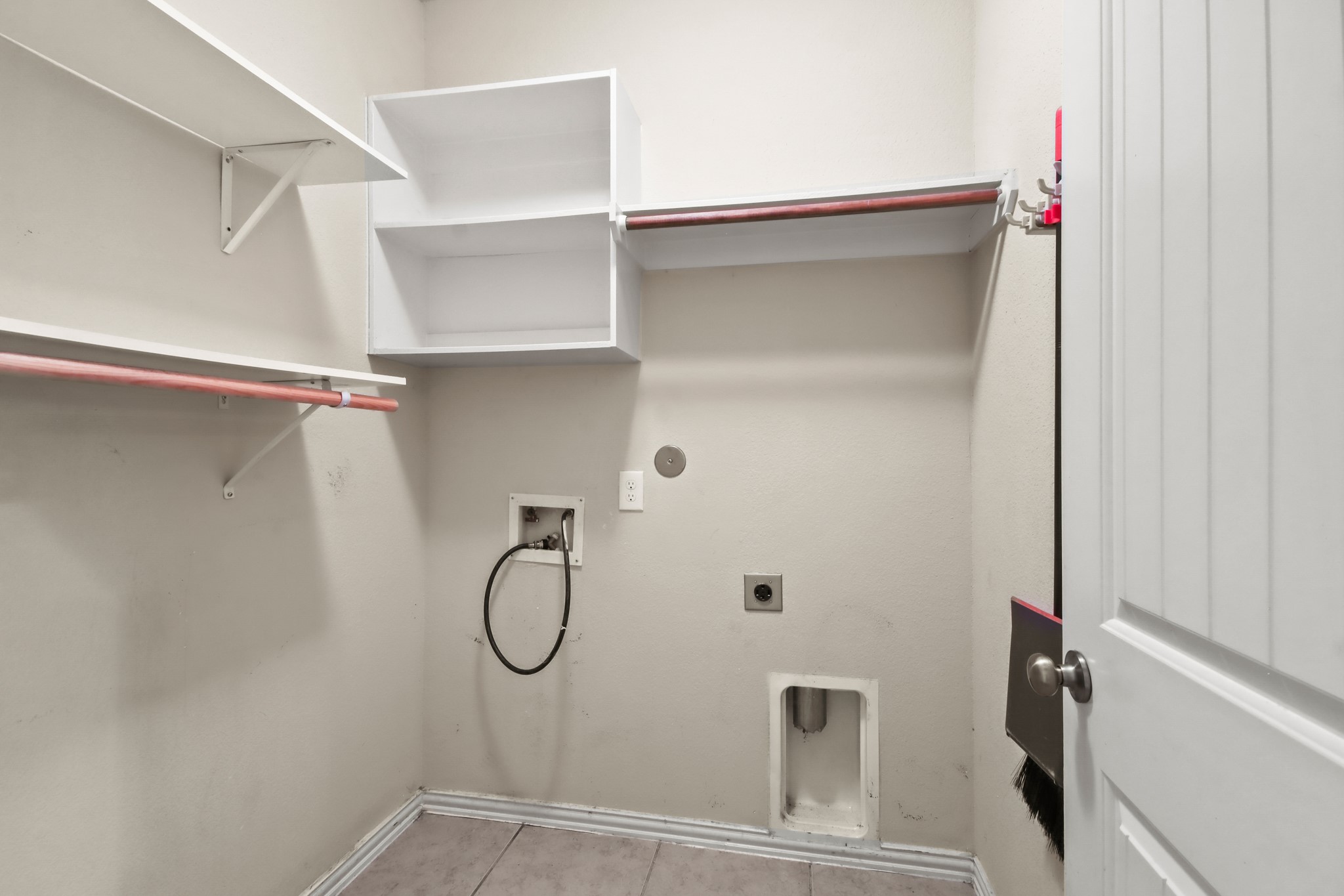 23122 Biddle Drive Porter, TX 77365 - Photo 19 of 26 In-house utility room with washer and dryer connections for added convenience.