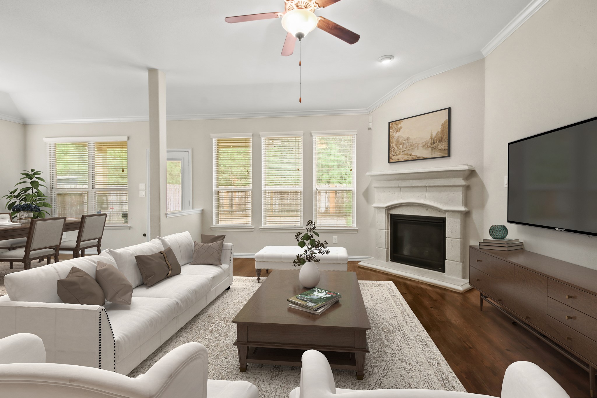 23122 Biddle Drive Porter, TX 77365 - Photo 22 of 26 Spacious living room with a cozy gas fireplace and an open floor plan.