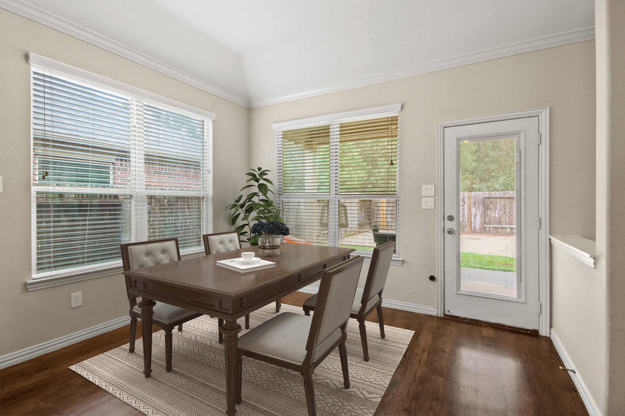 23122 Biddle Drive Porter, TX 77365 - Photo 6 of 26 Bright breakfast area with large windows offering a view of the backyard.