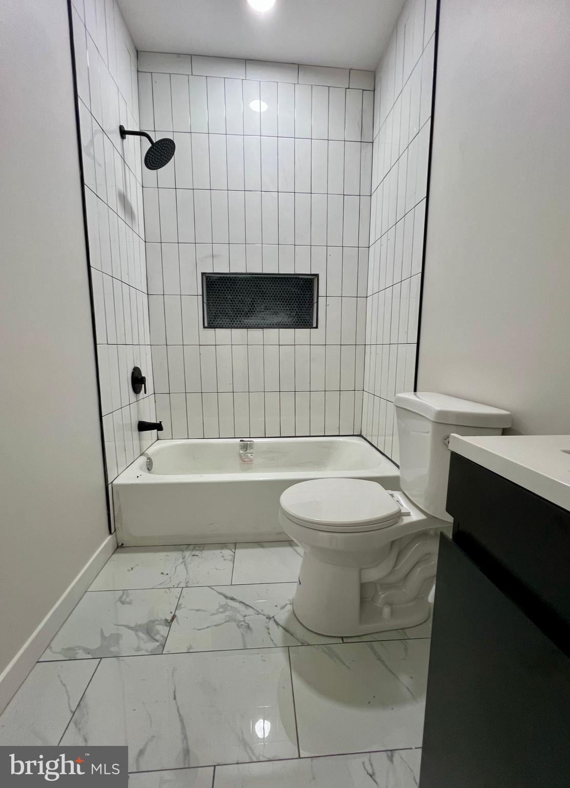 32 South 62nd Street, Unit 2 Philadelphia, PA 19139 - Photo 10 of 15 a bathroom with a toilet and a shower