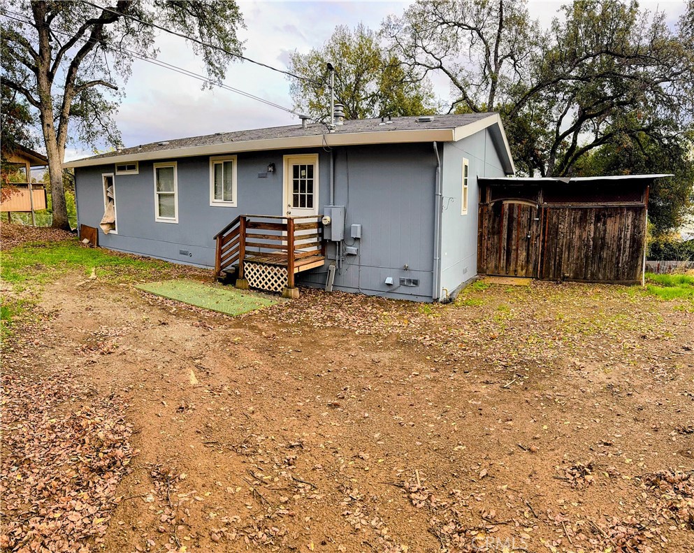 a house with trees in the background