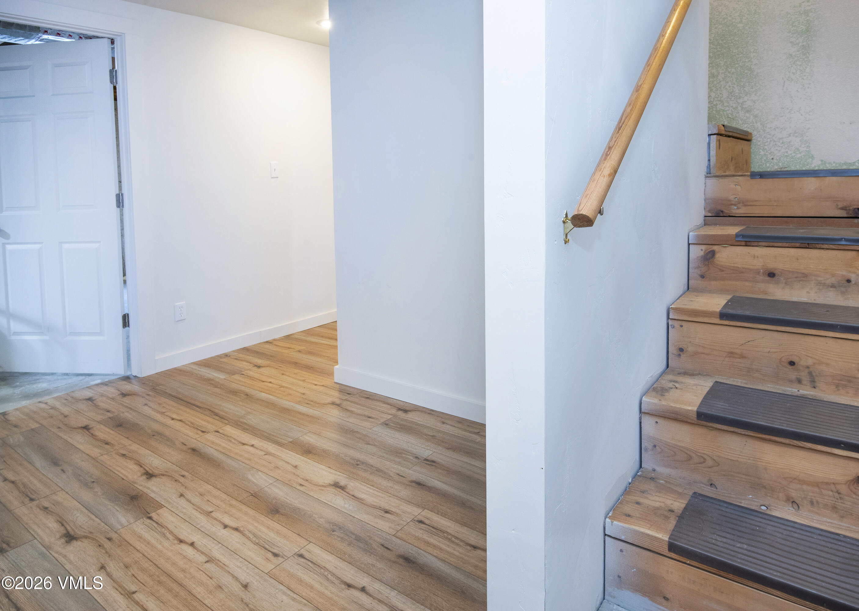 430 Porphyry Road Gypsum, CO 81637 - Photo 17 of 42 a view of an entryway with wooden floor