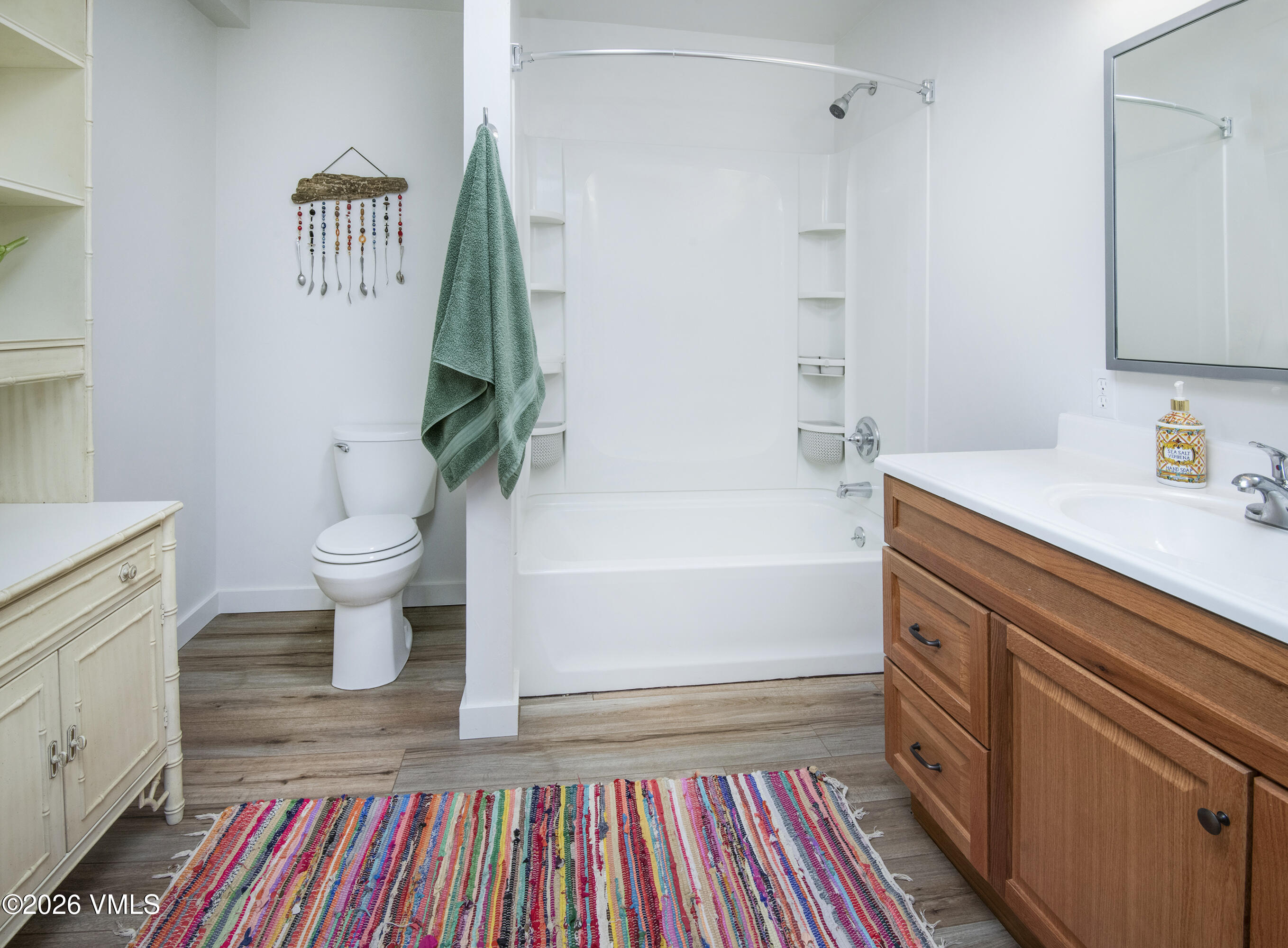 430 Porphyry Road Gypsum, CO 81637 - Photo 21 of 42 a bathroom with a sink a toilet and shower