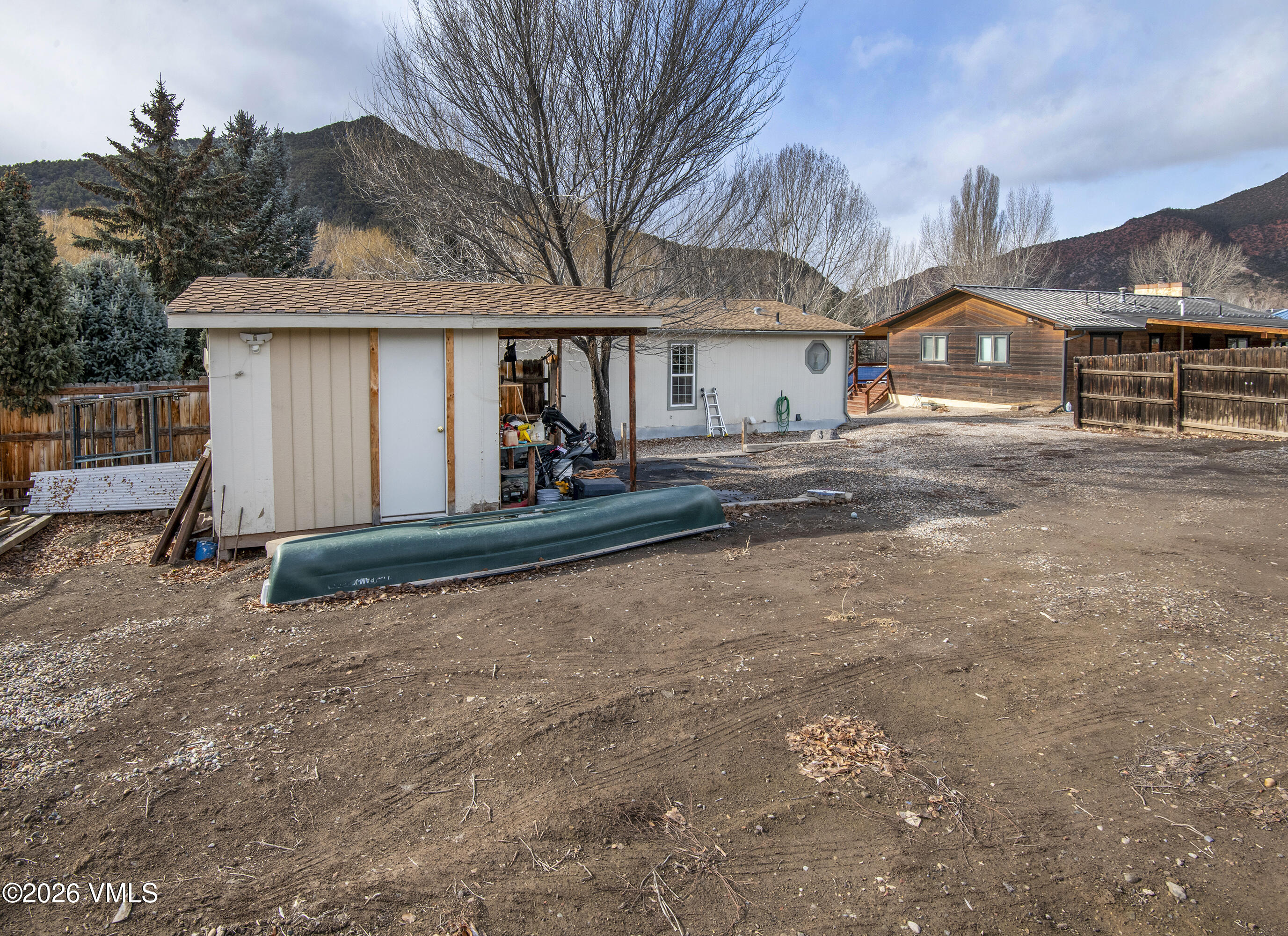 430 Porphyry Road Gypsum, CO 81637 - Photo 36 of 42 a view of a house with a yard and garage