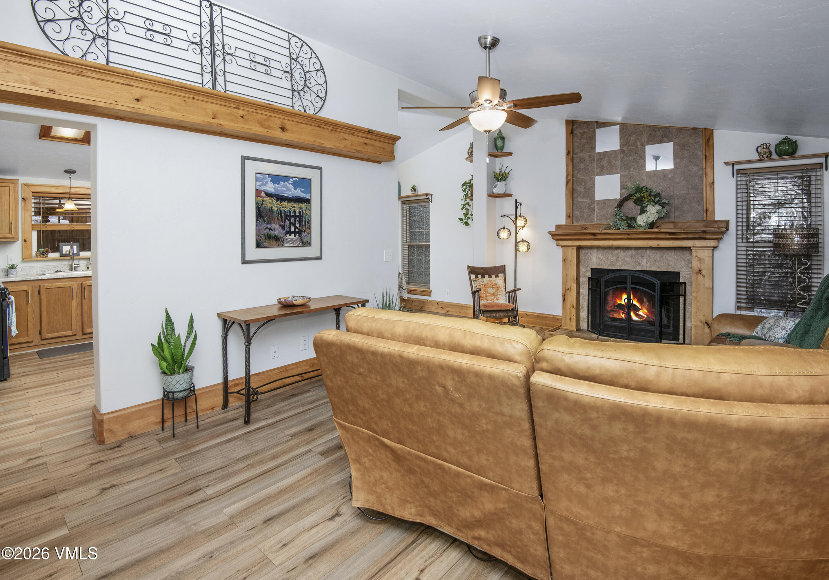 430 Porphyry Road Gypsum, CO 81637 - Photo 6 of 42 a living room with furniture and a fireplace