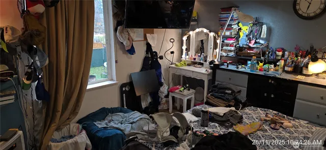 a room with furniture and a mirror