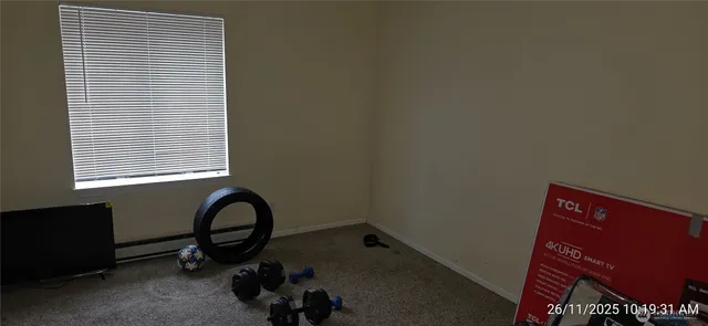 a view of a room with a window