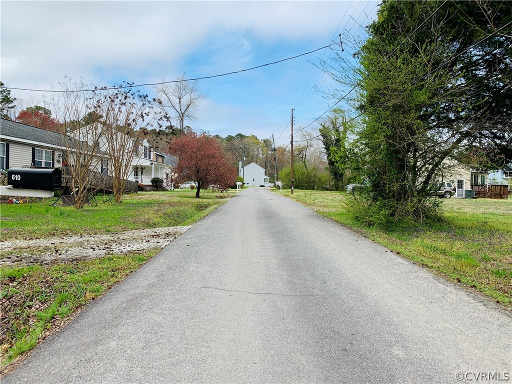 609 Maple Road Yorktown, VA 23690 - Photo 5 of 45 a view of a building with a yard