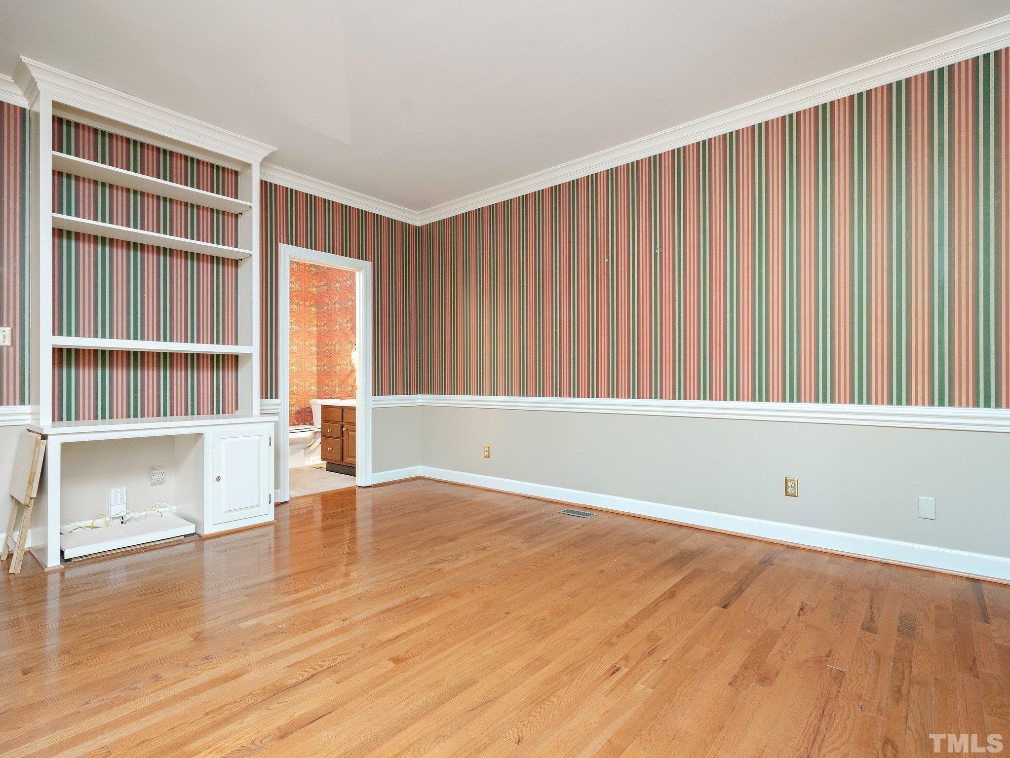 417 Weathergreen Drive Raleigh, NC 27615 - Photo 19 of 37 wooden floor in an empty room with a window
