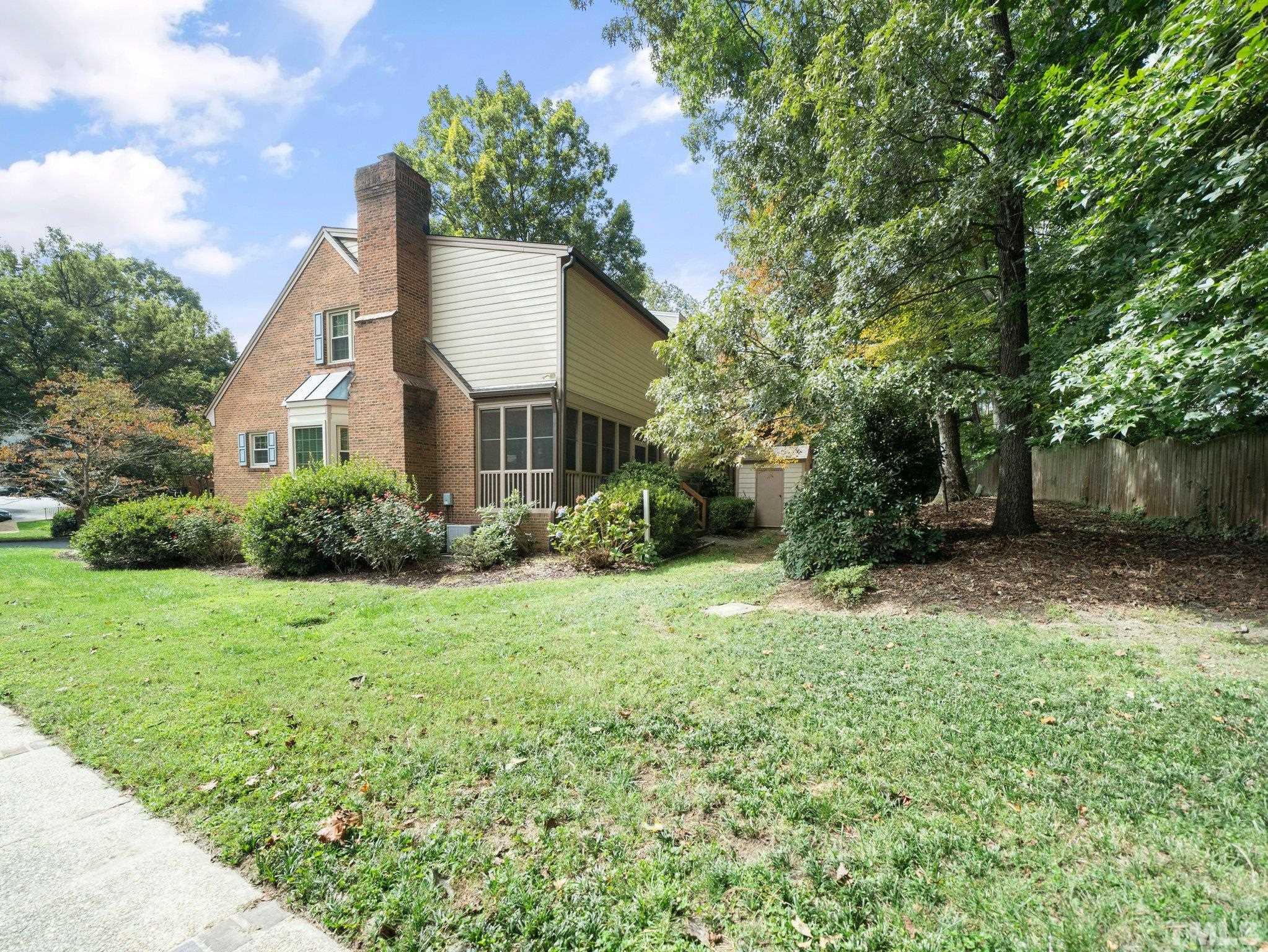 417 Weathergreen Drive Raleigh, NC 27615 - Photo 37 of 37 a house that has a tree in front of it