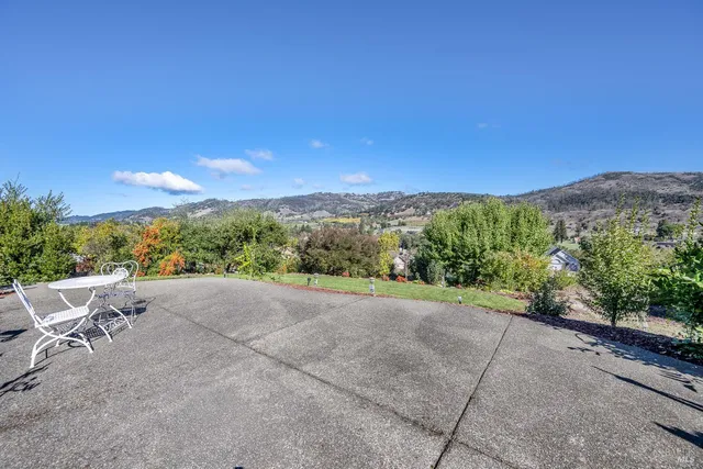 a view of a terrace with a yard
