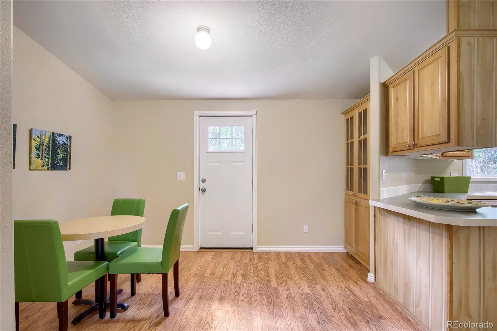 120 Blue Spruce Road Black Hawk, CO 80422 - Photo 6 of 27 a living room with furniture and a wooden floor