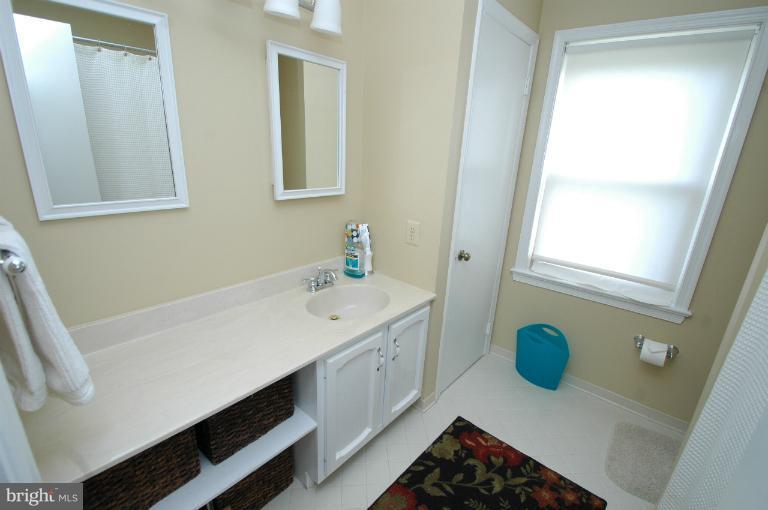 4331 Cub Run Road Chantilly, VA 20151 - Photo 11 of 30 a bathroom with a sink and a window