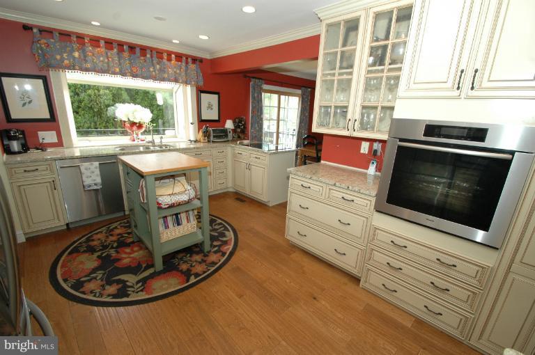 4331 Cub Run Road Chantilly, VA 20151 - Photo 12 of 30 a kitchen with a stove and a microwave