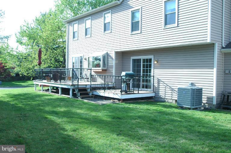 4331 Cub Run Road Chantilly, VA 20151 - Photo 15 of 30 a view of a house with a backyard and a deck