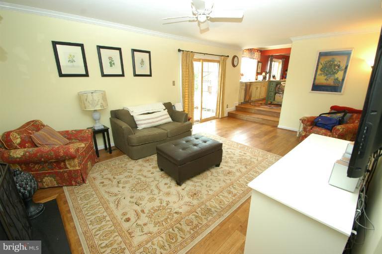 4331 Cub Run Road Chantilly, VA 20151 - Photo 18 of 30 a living room with furniture and a wooden floor