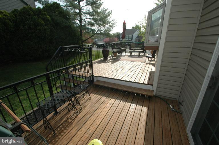 4331 Cub Run Road Chantilly, VA 20151 - Photo 24 of 30 a view of balcony with wooden floor and outdoor seating